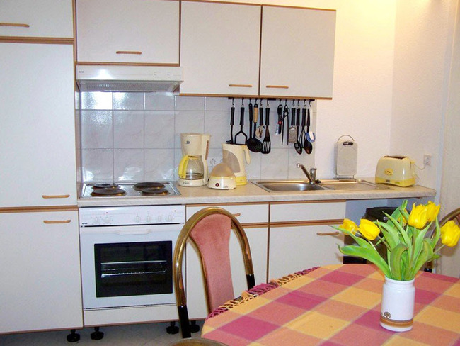 Ferienwohnung für 6 Personen - Küche mit Elektroherd und Backofen, Kühlschrank