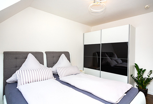 Fewo Meersinn - Schlafzimmer mit Doppelbett